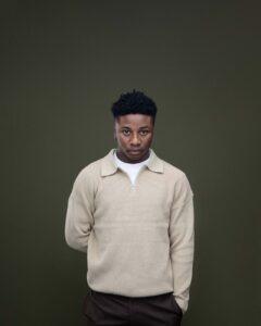 Illustration of The Difference Between Quarter Zip and Crew Neck Sweaters